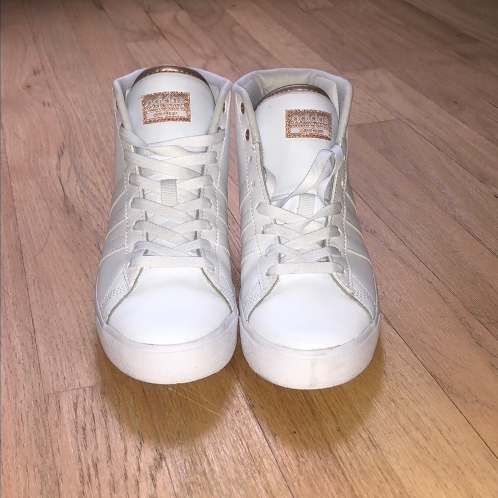 High top Adidas sneakers with rose gold